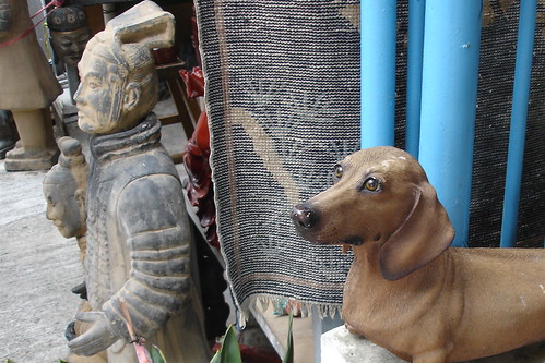 Weiner Dog and Chinese Statue