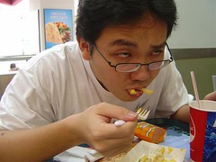 Koktiong enjoying his unhealthy lunch.