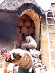 Unloading the kiln with posts visible inside