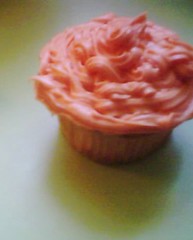 orange frosted cupcake